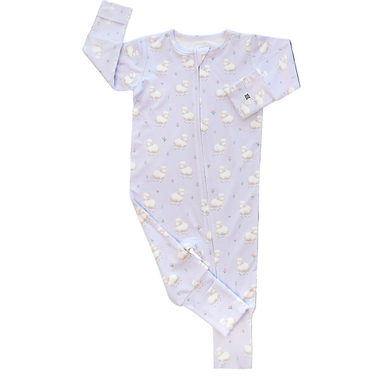 Baby onesie with cloud pattern on a white background