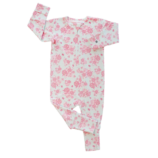 Floral-patterned baby onesie on a white background
