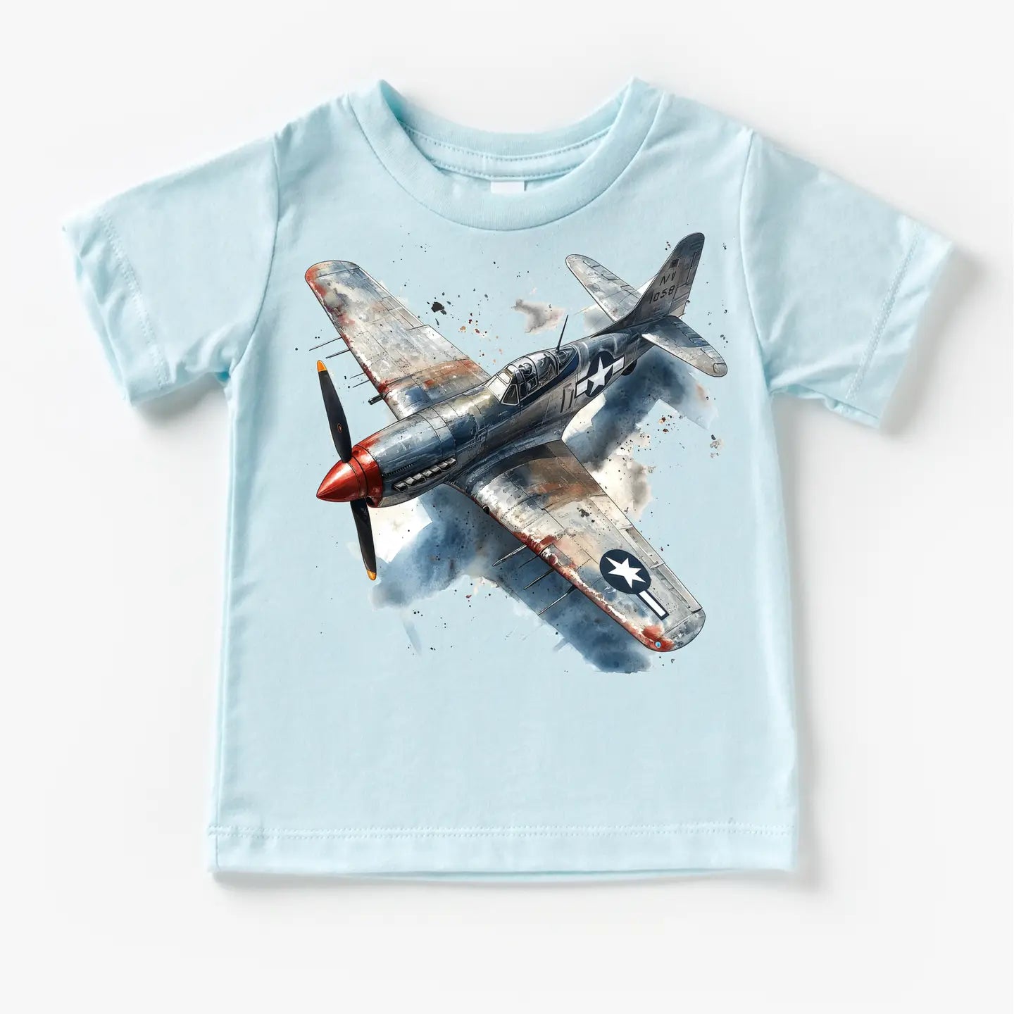 Light blue t-shirt with a graphic of an airplane on a white background
