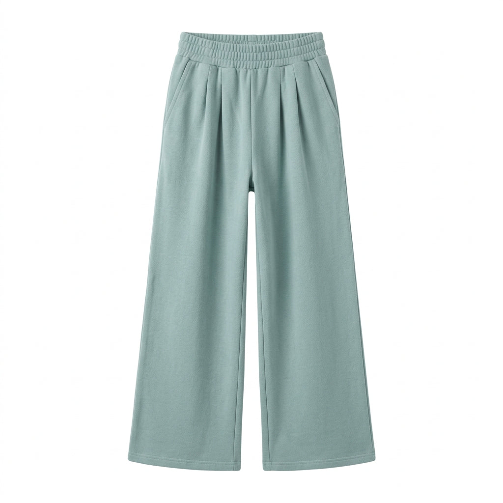 Blue green wide leg pants with elastic waist on a white background