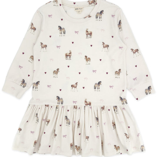 White dress with horse pattern on a white background