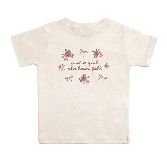 cream girls tee with the text: Just a girl who loves fall with floral decor around the text