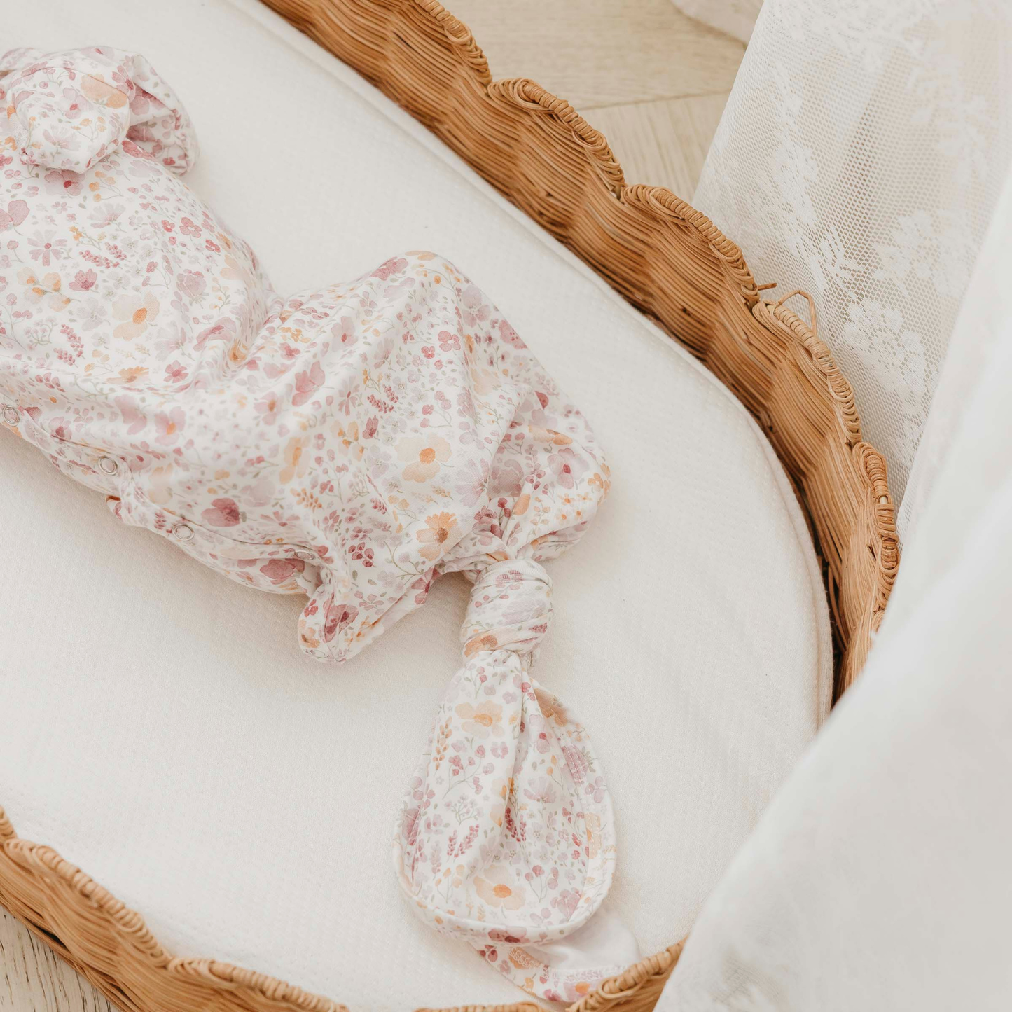 Floral print baby gown with knotted bottom