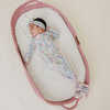 Floral baby knotted gown with pink trim and snaps