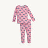 Pink pajama set with blue heart patterns on a white background