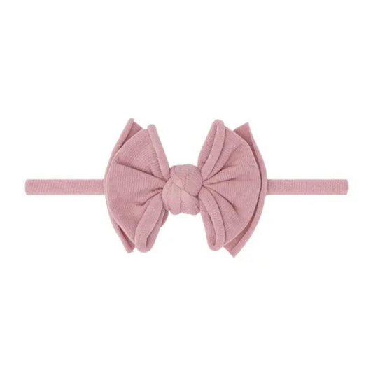 Pink headband with a bow