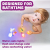 Colorful mermaid and sea creature bath toys on white background.