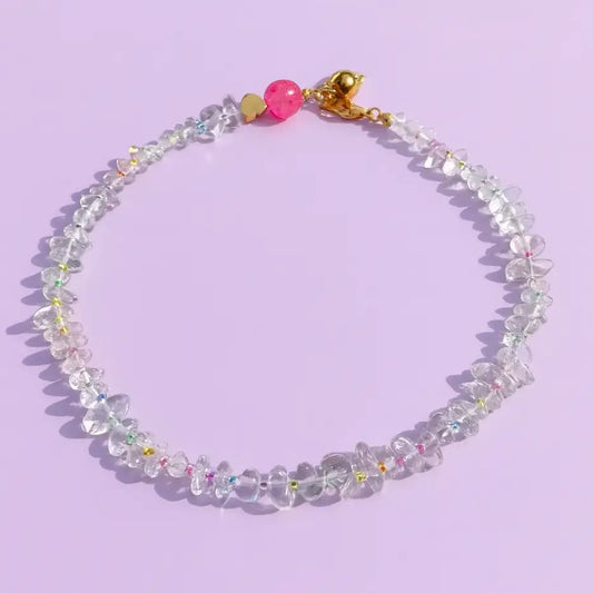 Irregular shaped clear beads on necklace with multicolored beads and magnetic clasp