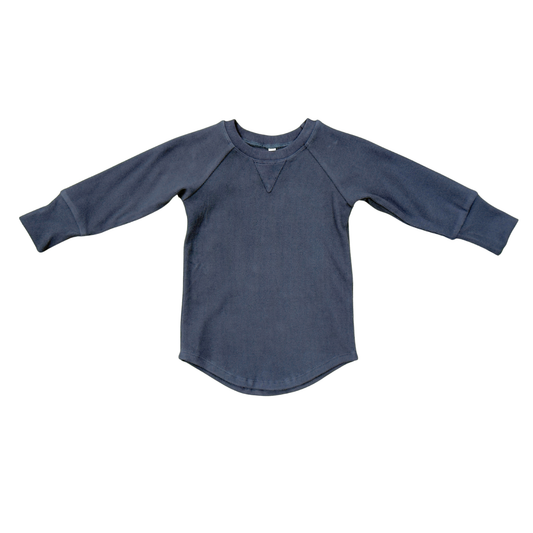 Blue long-sleeve shirt on a white background