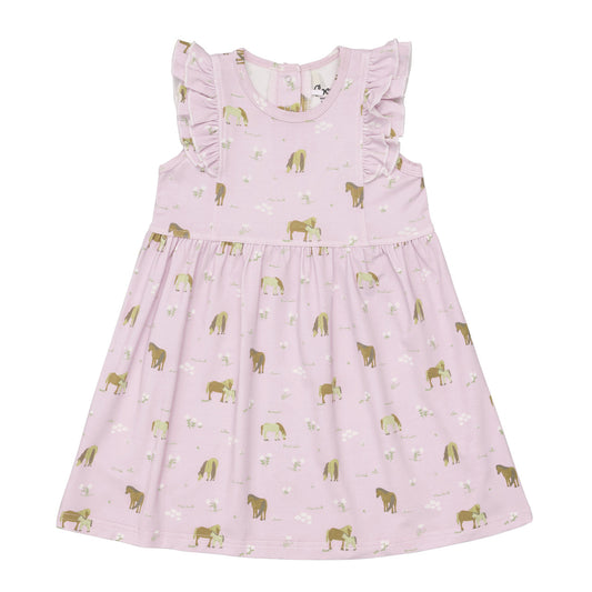 Pink dress with horse pattern on a white background