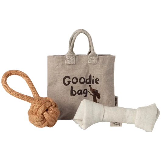 Doggie goodie bag with a rope toy and magnetic bone