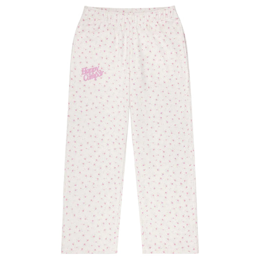 White pajama pants with pink floral pattern and 'Happy Camp3r' text