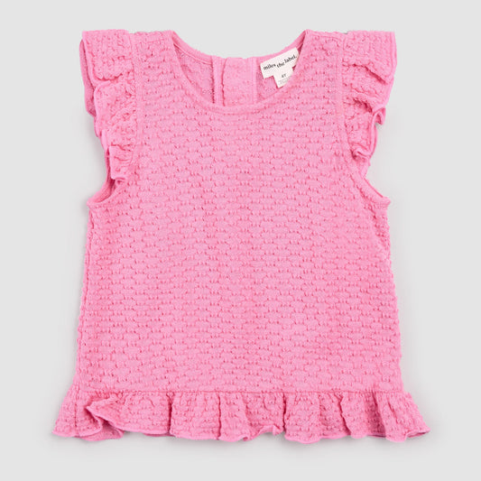 Pink textured top with ruffled details