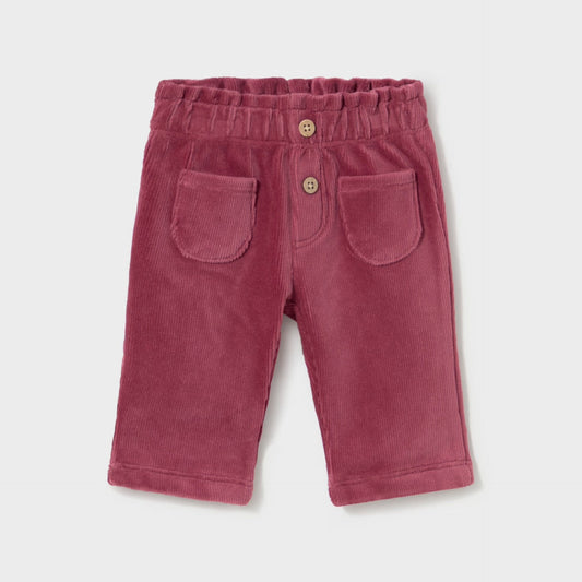 A pair of toddler's corduroy shorts in a dusty rose pink color, featuring an elastic waistband with two decorative buttons and two front patch pockets, shown flat on a light gray background.