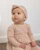 Baby wearing the Rose Microstripe Headband, lifestyle photo