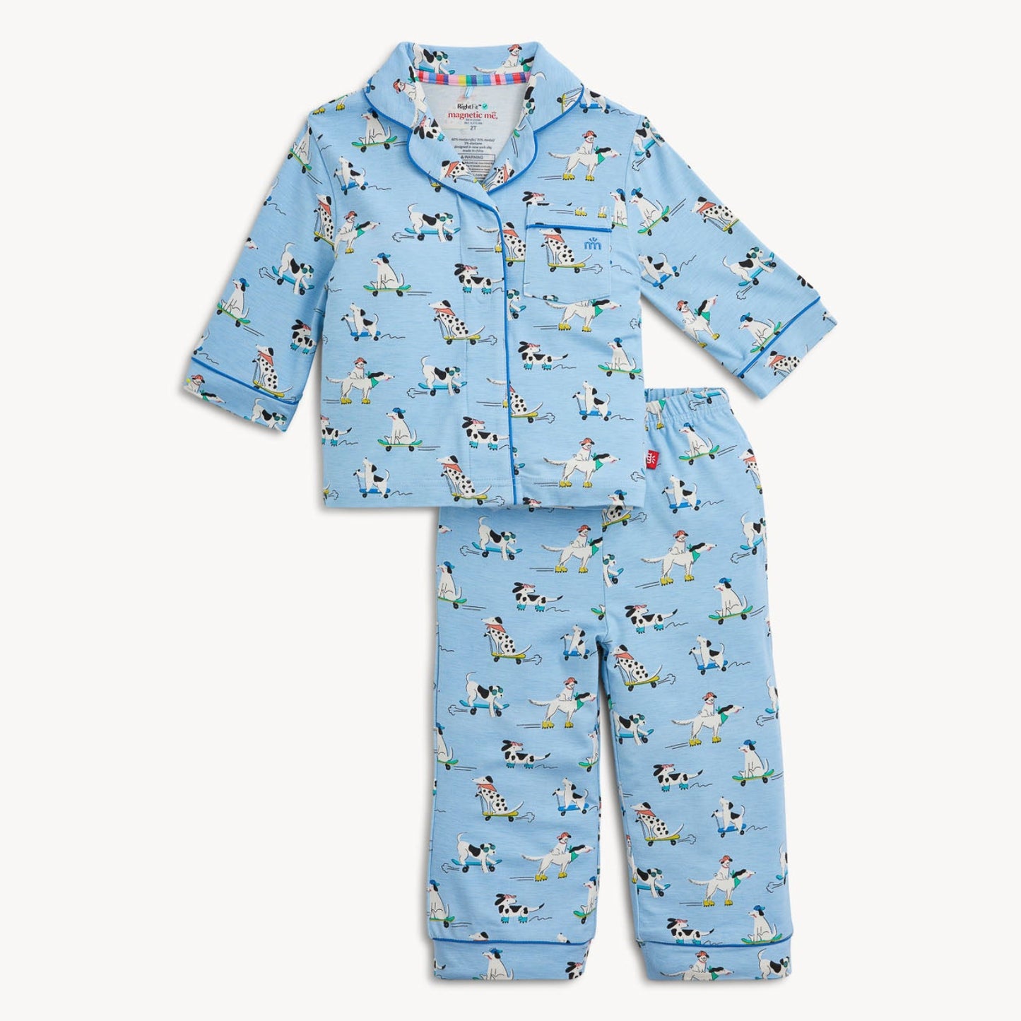 Children's pajama set with blue pattern on a plain background