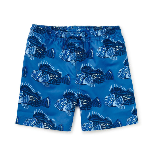 Blue swim trunks with fish pattern