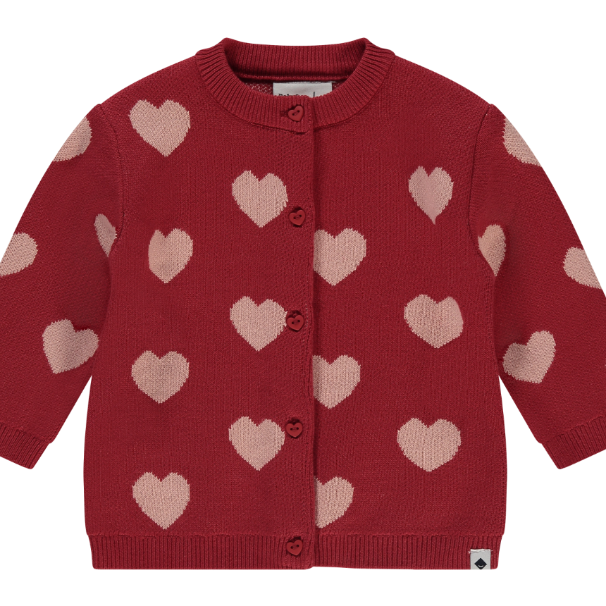 A red cardigan with pink hearts pattern, buttoned at the front, suitable for baby girls.