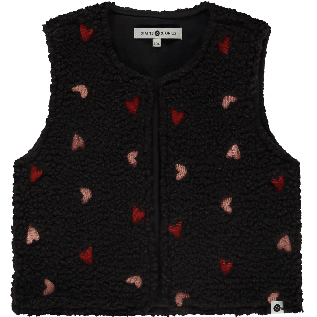 A black fleece vest for girls with embroidered red and pink hearts on the front.
