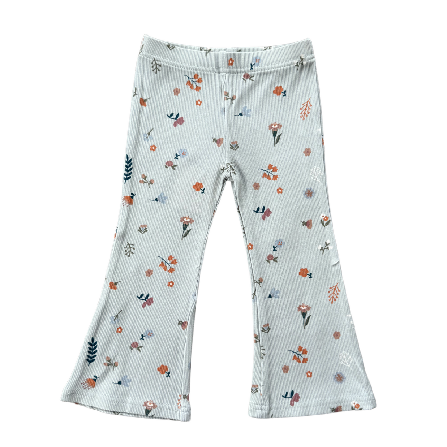 Floral-patterned pants on a white background
