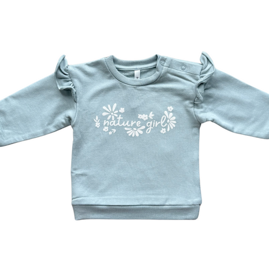 Light blue sweatshirt with 'nature girl' text on a white background