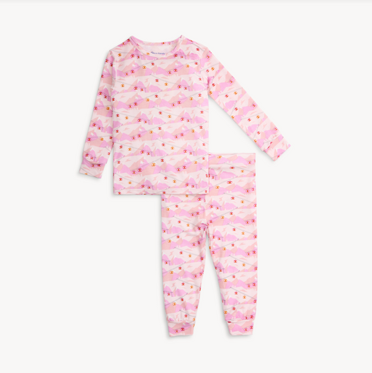 Pink children's pajama set with a pattern on a white background