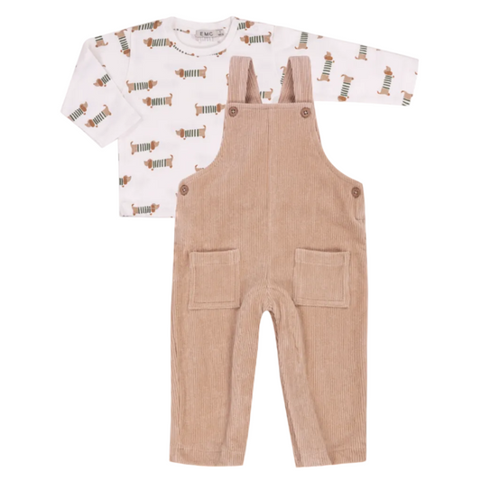 Baby outfit with white shirt and beige overalls on a white background