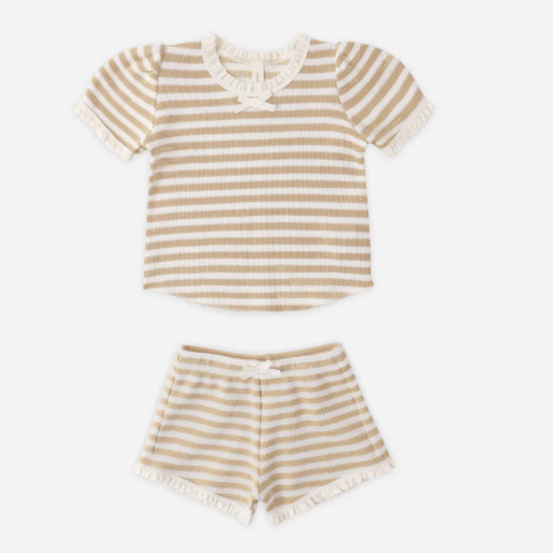 Striped shirt and shorts set on a white background