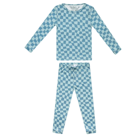 Blue and white checkered pajama set on a white background