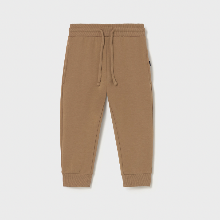 Beige sweatpants with a drawstring on a white background