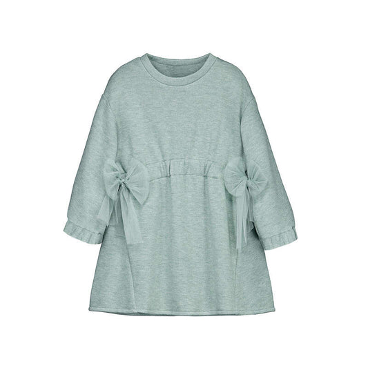 A light sage green long-sleeve top for toddlers, featuring a crew neck, gathered waist, and matching fabric bows on both sleeves, shown against a plain white background.