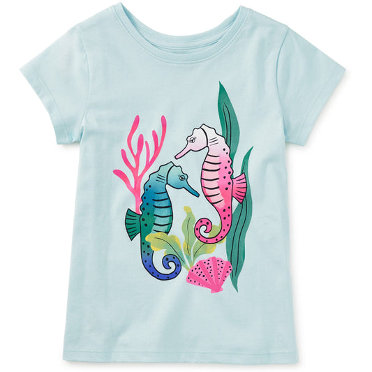 Light blue t-shirt with colorful seahorse design on a white background