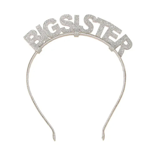 A silver glitter 'BIG SISTER' party headband on a solid white background.