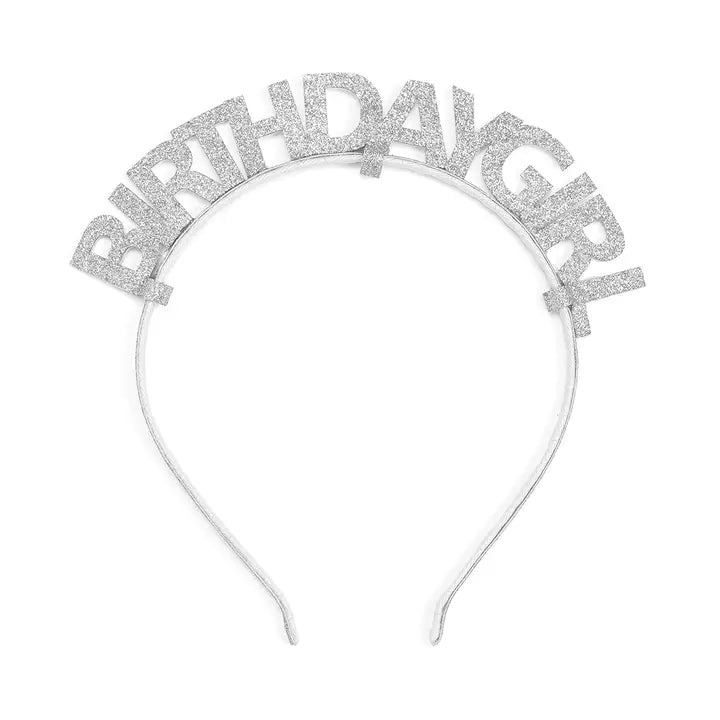 Silver 'BIRTHDAY GIRL' headband on a white background