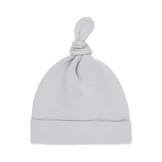 Light blue baby hat with a knot on top