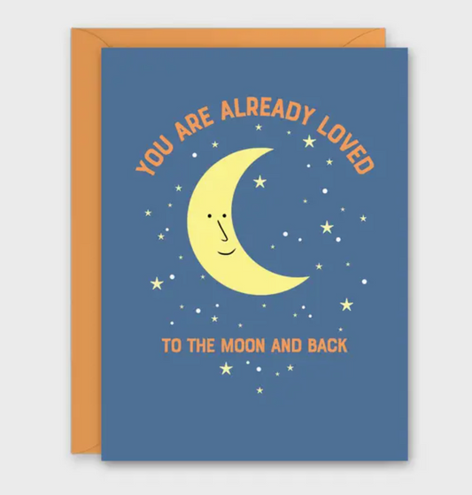 Card with a smiling moon and stars on a blue background with text 'You are already loved to the moon and back'.