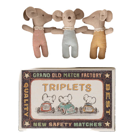 Three toy mice in a matchbox with a vintage-style matchbox label.