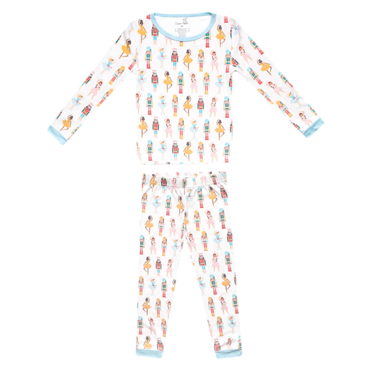 Children's pajama set with nutcracker pattern on a white background