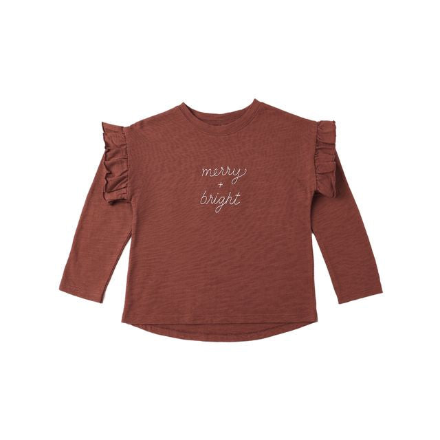 Red long-sleeve top with 'merry & bright' text on a white background