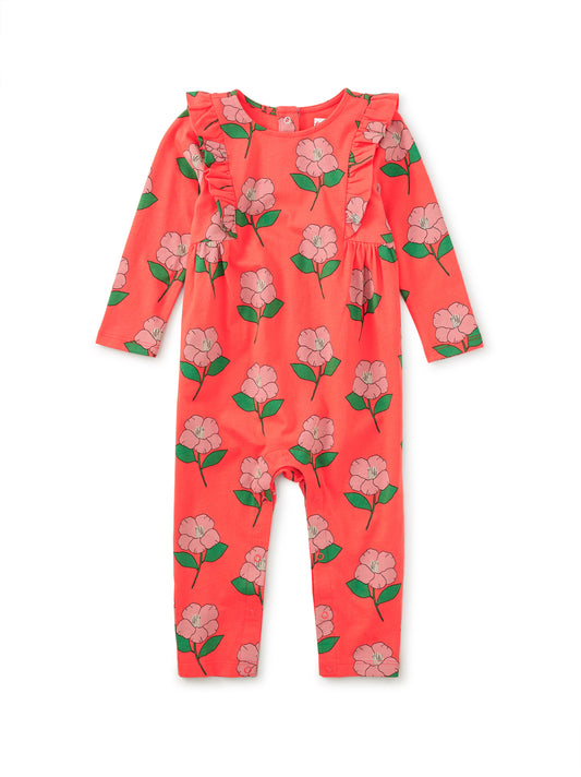 Floral patterned onesie on a white background