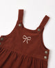 Ruby corduroy baby overalls with patch pockets and brass buttons by Rylee and Cru