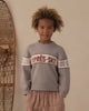 Flat lay of the Apres Ski Reagan Sweater showing the ribbed trim detail