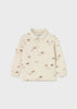 long-sleeve polo shirt with horse pattern on a light background