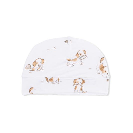 White baby hat with brown dog pattern