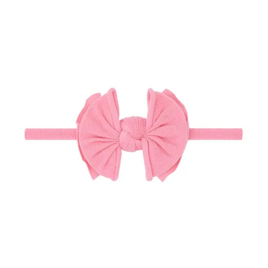 Pink headband with a bow