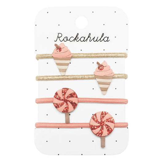 Set of hair clips with ice cream and candy designs on a Rockahula branded card.