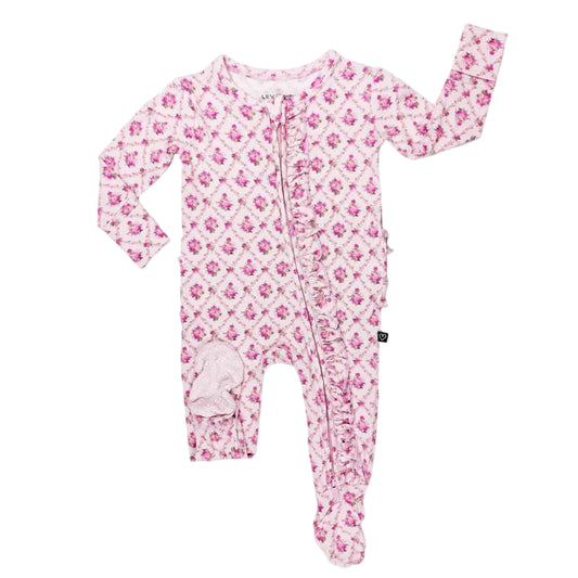 Pink floral baby onesie with footies on a white background