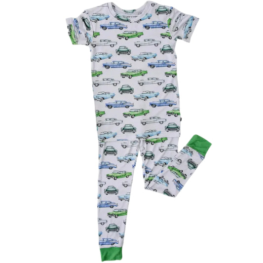 Children's pajama set with car pattern on a white background