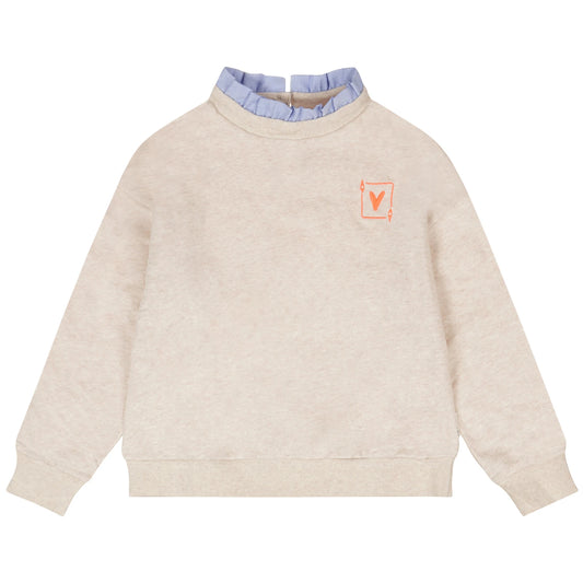 Beige sweater with a small logo on a white background