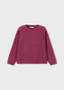 Maroon sweater on a light gray background